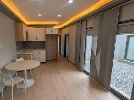 Moderniai įrengtas modulinis gyvenamasis namelis –