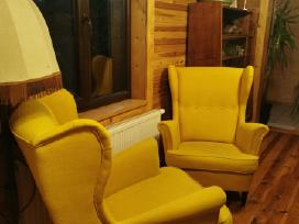 Du Ikea Strandmon geltoni foteliai