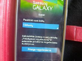 Samsung Galaxy Grand Neo (GT-i9060i) su įkrovėju