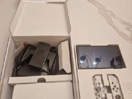 Nintendo Switch Oled 64 GB.