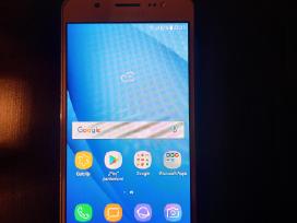 Samsung Galaxy J5 (2016) su įkrovikliu