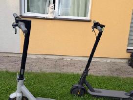 Elektrinis "ninebot" paspirtukas ir juodas dovanų.