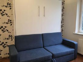 Transformuojama sofa-lova. Spintoje lova