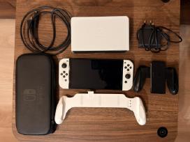 Nintendo Switch Oled + 64gb micro sd + Grip'as