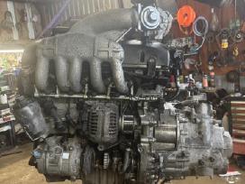 T5-96kw 2,5tdi kodas Axd .