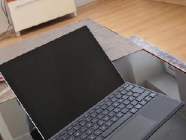 Microsoft surface pro 7. I7, 16gb RAM, 256gb