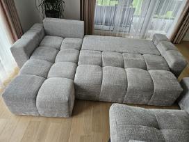 Beveik nauja sofa su lovos funkcija ir pufu.