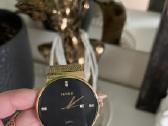 Rado analoginis laikrodis
