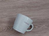 Latte kavos puodelis