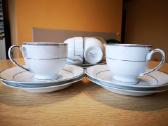 Porceleniniai puodeliai su lėkštutėm