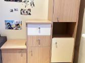 Vaikų kambario talpi spintelė
