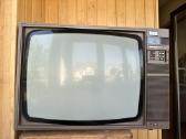 Senovinis Philips televizorius mediniame rėme