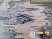 CD Tarkan. Karma. 2004 - nuotraukos Nr. 2