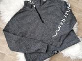 Calvin Klein apkarpytas S dydžio megztinis