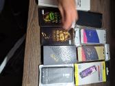 Telefonu dėkliukai krovikliai stikliukai