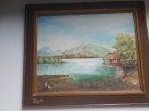 Nedidelis paveikslas su ežeru ir kalnais
