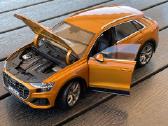188371 Audi Q8, orange 1:18 kolekcinis modelis