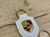 Porsche raktu pakabukai - nuotraukos Nr. 11