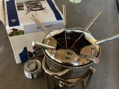 Visai naujasfondue puodas