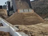 Vežame smėli,skalda,juodzemi,frezuota asfalta