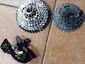 Shimano deore XT kasete ir galinis begiu permeteja