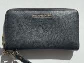 Michael Kors odine pinigine