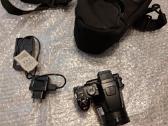 Olimpus E410, Nikon Coolpix P100