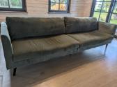 Didelė žalia sofa