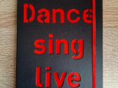 Dance sing live sąsiuvinis langeliais su gumele