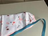 Neperšlampamas seilinukas su rankovėmis - nuotraukos Nr. 6