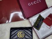Odinė Gucci piniginė