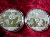 Sidabrinė 31,1 g. moneta Kinijos Panda 2012, 2013
