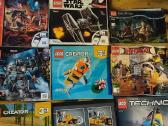 Lego instrukcijų knygelės ir du zurnalai