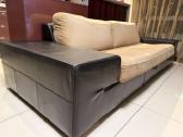 Sofa su miegama funkcija ir pufiku