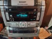 Sharp Centras ,fm,aux, Mc,CD-neveikia