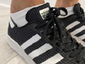 Juodi adidas "Superstar" laisvalaikio sportbačiai