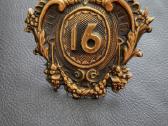 Bronzos durų numeris 16 ar 91