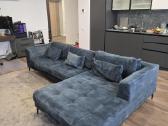 Kampinė sofa su miegamąja funkcija