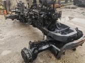 Traktorius New Holland 115 ardomas dalimis