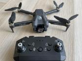 Mini 3 dronas su kamera