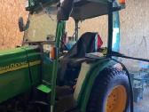 John Deere traktorius