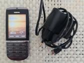 Nokia Asha 300(rm-781) su pakroveju.
