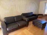 Odinė sofa + sofa lova + pufas