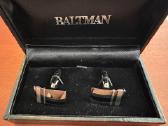 Baltman juodo blizgaus metalo elegantiškos sąsagos