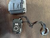 Nikon Coolpix fotoaparatas su dėklu – kompaktiškas