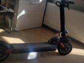 Galingas 2 motoru elektrinis paspirtukas