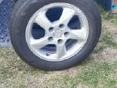 Pigiai parduodame 4 Mazda ratlankiai su padangomis