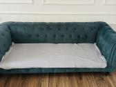 Žalia sofa