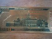 100 1000 doleriu auksiniai banknotai kaina 5 eurai