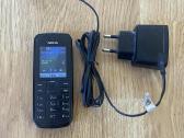 Nokia 113 su pakrovėju